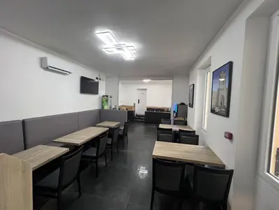 Télévision ou salle de divertissement dans l'établissement Hotel Le royal