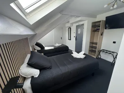 Télévision ou salle de divertissement dans l'établissement Hotel Le royal