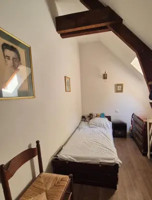 Un ou plusieurs lits dans un hébergement de l'établissement La maison du bord de l'eau plage de baignade