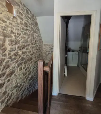 Salle de bains dans l'établissement La maison du bord de l'eau plage de baignade