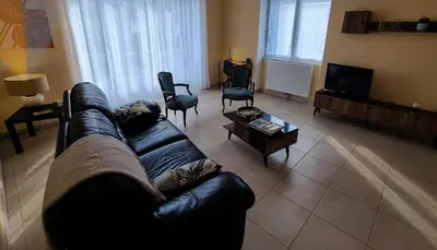 Coin salon dans l'établissement Ces jours en Corrèze - Cosnac