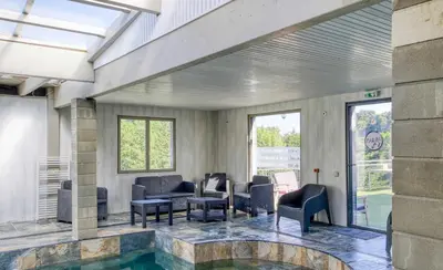 Coin salon dans l'établissement Le Paradis