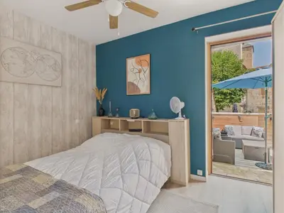 Un ou plusieurs lits dans un hébergement de l'établissement Escapade à 2 sur Auriac avec jardin cosy