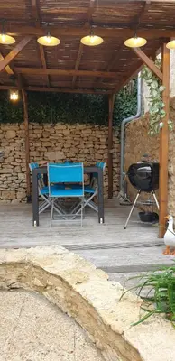 Terrasse ou espace extérieur de l'établissement Escapade à 2 sur Auriac avec jardin cosy