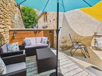 Terrasse ou espace extérieur de l'établissement Escapade à 2 sur Auriac avec jardin cosy