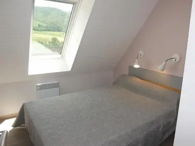 Un ou plusieurs lits dans un hébergement de l'établissement Gite 3 Grand Gîte 7-9 Personnes au Pied du Puy Mary