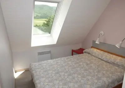 Un ou plusieurs lits dans un hébergement de l'établissement Gite 16 Vacances en Gîte au Puy Mary Découvrez le Parc Naturel des Volcans
