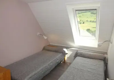 Un ou plusieurs lits dans un hébergement de l'établissement Gite 15 Gîte 4-6 Personnes Puy Mary Idéal pour Randonnées et VTT