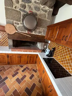 Cuisine ou kitchenette dans l'établissement La Maison du Colonel