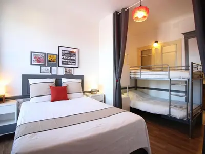 Un ou plusieurs lits dans un hébergement de l'établissement Appartement T2 centre La Bourboule, 4 pers, Wifi - FR-1-608-285