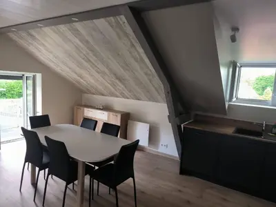 Coin salon dans l'établissement La Bourboule - Étoile des neiges - Appartement refait à neuf - 2 chambres wifi - randonnée la Roche des Fées