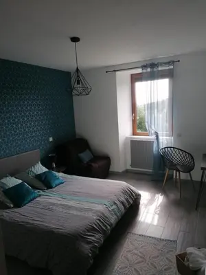Un ou plusieurs lits dans un hébergement de l'établissement La Maison de Valie
