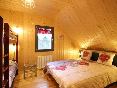 Un ou plusieurs lits dans un hébergement de l'établissement Chalet moderne au Mont-Dore, 8 pers, terrasse, proximité centre - FR-1-608-286