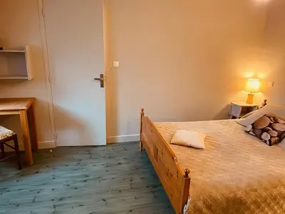 Un ou plusieurs lits dans un hébergement de l'établissement Grange authentique en Quercy