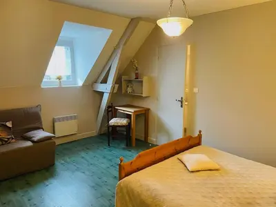 Un ou plusieurs lits dans un hébergement de l'établissement Grange authentique en Quercy
