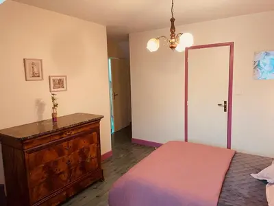 Un ou plusieurs lits dans un hébergement de l'établissement Grange authentique en Quercy