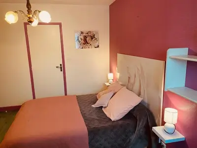 Un ou plusieurs lits dans un hébergement de l'établissement Grange authentique en Quercy