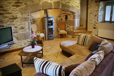 Coin salon dans l'établissement Gite de felgines