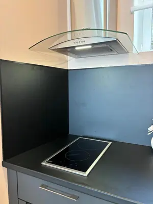 Cuisine ou kitchenette dans l'établissement Studio centre ville La Bourboule