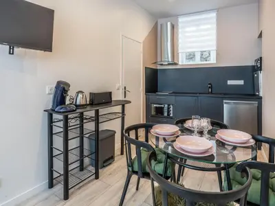 Cuisine ou kitchenette dans l'établissement Studio centre ville La Bourboule