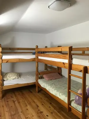 Un ou plusieurs lits dans un hébergement de l'établissement La ferme du Liaumiers