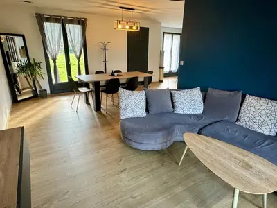 Coin salon dans l'établissement Maison de plain pied 3 chambres