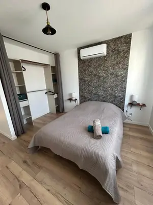 Un ou plusieurs lits dans un hébergement de l'établissement Superbe pavillon 4 chambres - parking privé - Grande Terrasse au calme - limoges
