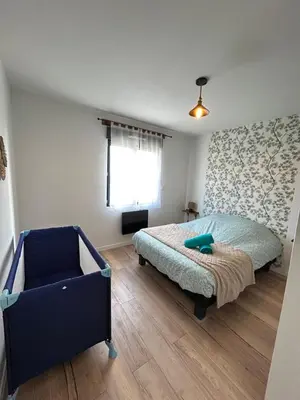Un ou plusieurs lits dans un hébergement de l'établissement Superbe pavillon 4 chambres - parking privé - Grande Terrasse au calme - limoges