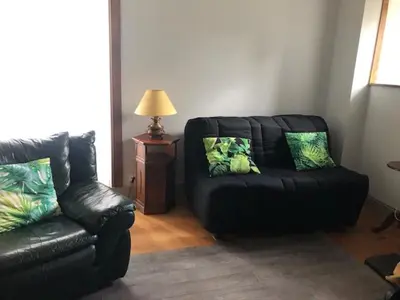 Coin salon dans l'établissement Maison Auvergnate 8 pers
