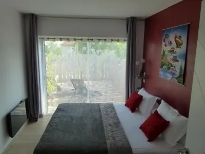 Un ou plusieurs lits dans un hébergement de l'établissement Chambre d'hôtes du Pilou