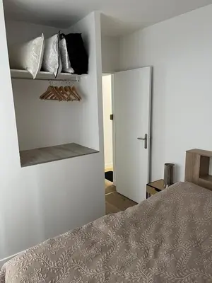 Un ou plusieurs lits dans un hébergement de l'établissement Les balcons du 115 - appartement standing 4 étoiles