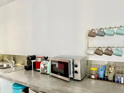 Cuisine ou kitchenette dans l'établissement Good Luck Rue de Strasbourg - DABNB
