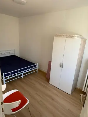 Un ou plusieurs lits dans un hébergement de l'établissement Les balcons du 115 BIS - Appartement standing