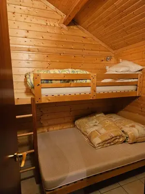 Un ou plusieurs lits dans un hébergement de l'établissement L'Auberge Saint Santin Cantales