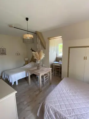 Un ou plusieurs lits dans un hébergement de l'établissement Moulin de Latouille