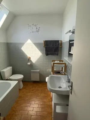 Salle de bains dans l'établissement Moulin de Latouille