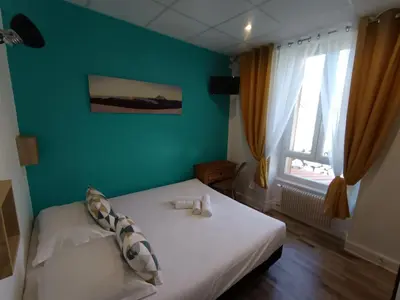 Un ou plusieurs lits dans un hébergement de l'établissement Entre Lacs et Volcans
