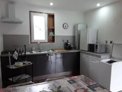 Cuisine ou kitchenette dans l'établissement Cocolac