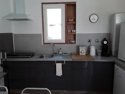Cuisine ou kitchenette dans l'établissement Cocolac