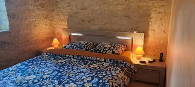 Un ou plusieurs lits dans un hébergement de l'établissement Canterane, un coin de paradis à la campagne