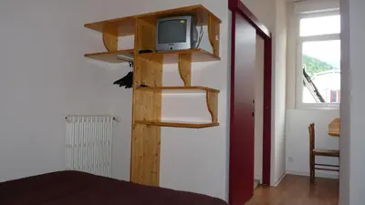 Télévision ou salle de divertissement dans l'établissement Résidence Le Castel Médicis