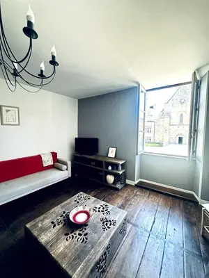Télévision ou salle de divertissement dans l'établissement Bel appartement Hôtel de ville