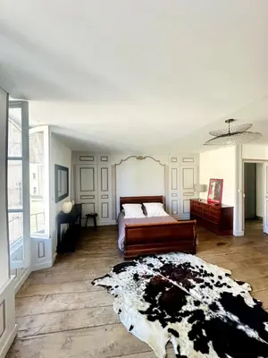 Un ou plusieurs lits dans un hébergement de l'établissement Bel appartement Hôtel de ville