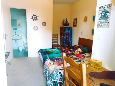 Un ou plusieurs lits dans un hébergement de l'établissement Les voyageurs