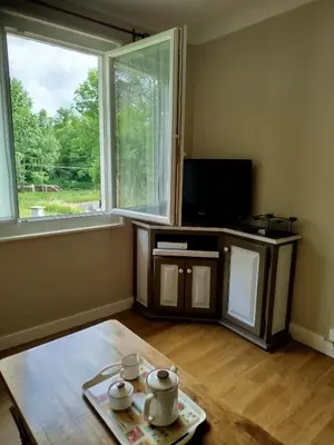 Télévision ou salle de divertissement dans l'établissement Le chant de l'ègue
