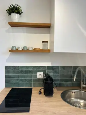 Cuisine ou kitchenette dans l'établissement La parenthèse, confortable appartement 2 pièces