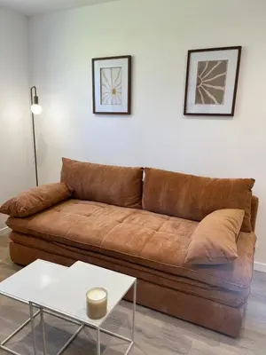 Coin salon dans l'établissement La parenthèse, confortable appartement 2 pièces