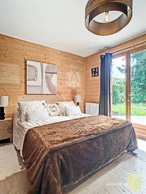 Un ou plusieurs lits dans un hébergement de l'établissement Chalet Les Mélèzes