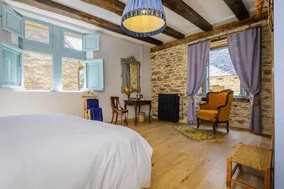 Un ou plusieurs lits dans un hébergement de l'établissement Lou Castel Chambres d'Hôtes