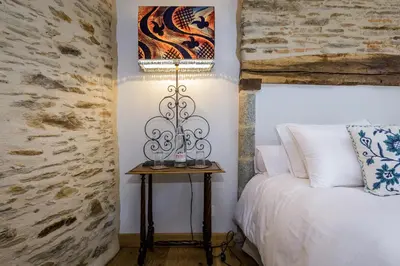 Un ou plusieurs lits dans un hébergement de l'établissement Lou Castel Chambres d'Hôtes